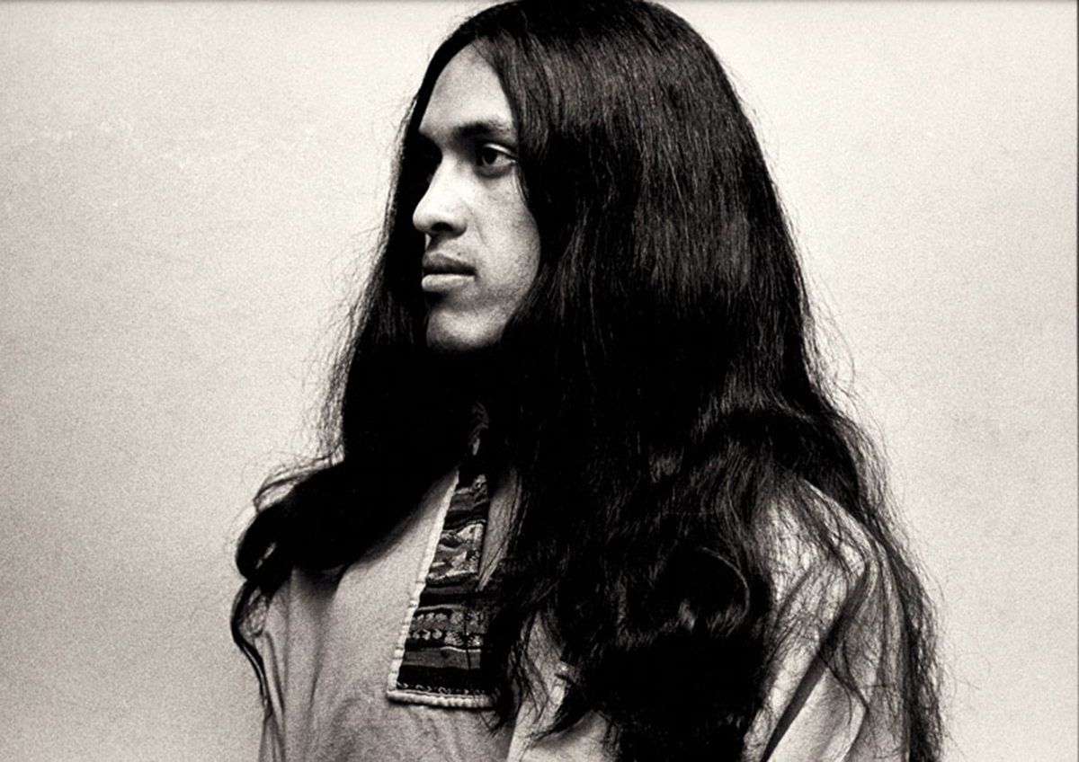 Peruvian musician. Golders Hill Park, Golders Green, London.